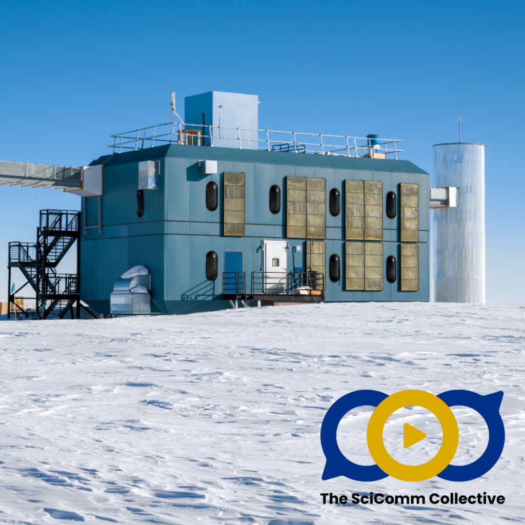 A cyan blue two-storey building with industrial shutters and iron escape exit stairs, with a blue sky behind and snow on the ground